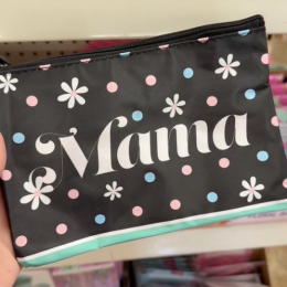 A shopper holds a cosmetic bag that says "mama" while shopping for the best Mother's Day gifts at Dollar Tree.