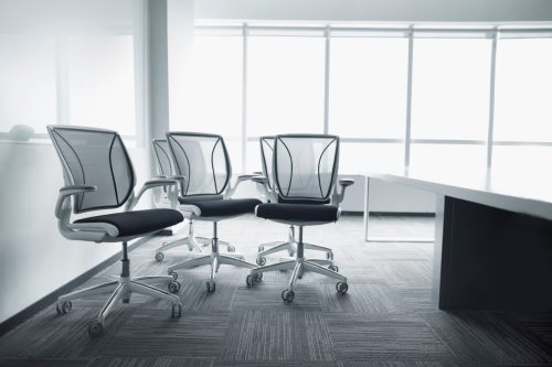 View of office chairs in business meeting room