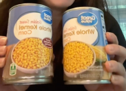 two cans of Walmart Great Value corn
