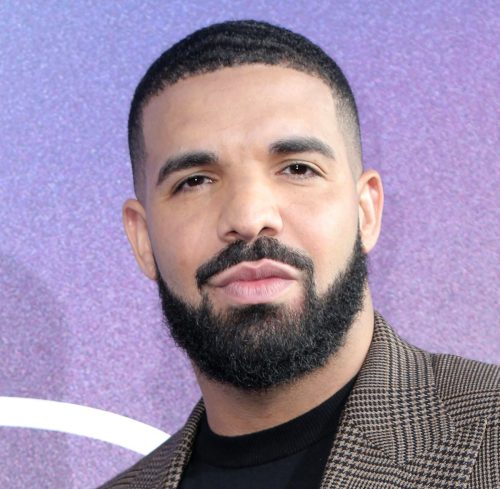 Portrait of Drake against a purple background