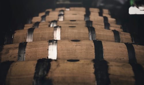 row of whiskey barrels