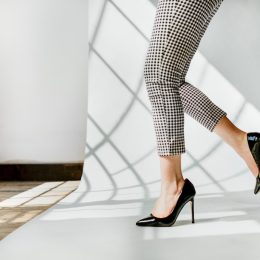 fashionable woman wearing black stilettos