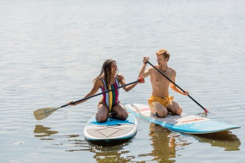 couple paddleboarding