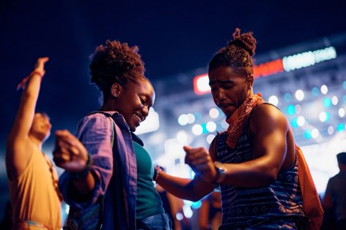 couple dancing at outdoor concert