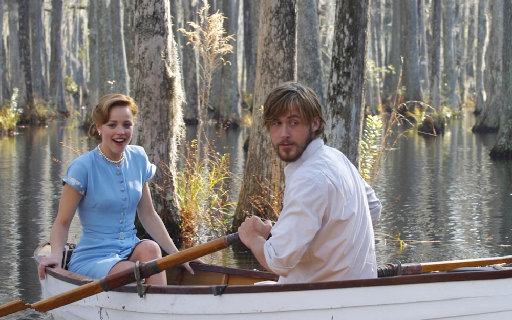 Rachel McAdams and Ryan Gosling in a rowboat in a scene from the movie The Notebook
