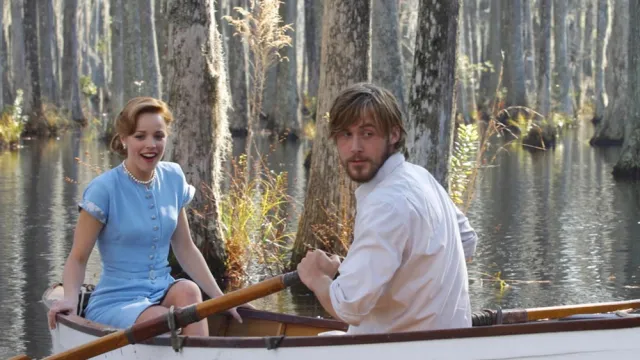 Rachel McAdams and Ryan Gosling in a rowboat in a scene from the movie The Notebook
