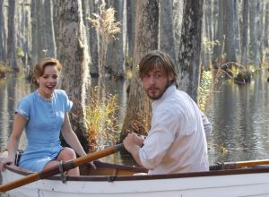 Rachel McAdams and Ryan Gosling in a rowboat in a scene from the movie The Notebook
