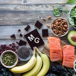 An assortment of food high in magnesium with the element symbol MG