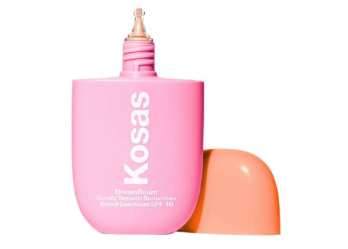 pink bottle of sunscreen on white background