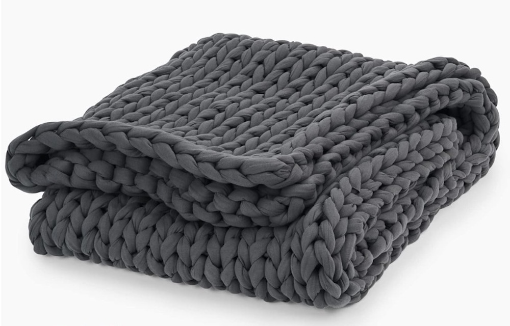 A folded Bearaby weighted blanket