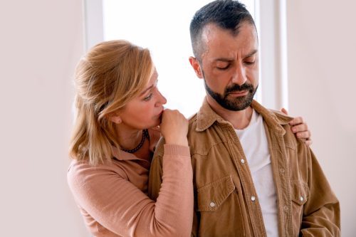 woman beginning her husband who can't say no