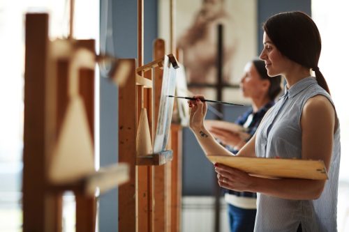 woman attending a painting class