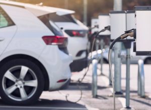 A parking lot with charging stations for electric cars.