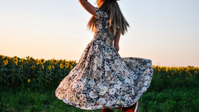 woman in bold floral dress
