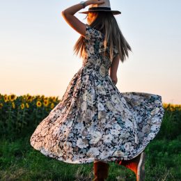 woman in bold floral dress