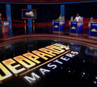View of the stage, host, and contestants on Jeopardy! Masters season 2
