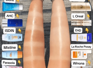 still from a video of a woman who tested 10 sunscreens on her legs