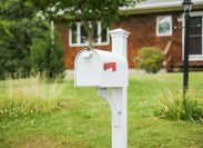 mailbox on a front lawn