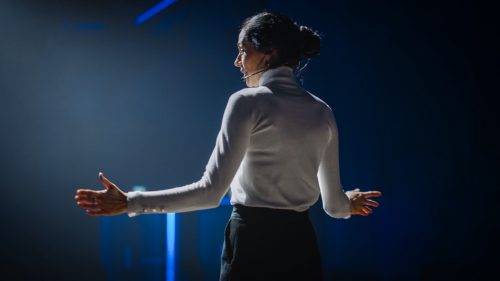 woman presenter giving a speech