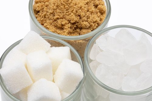 different types of sugar in jars