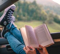 reading a book in the car
