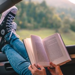 reading a book in the car