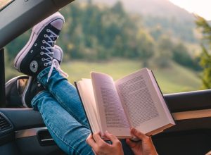 reading a book in the car