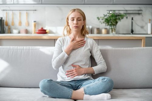 woman practicing breathing