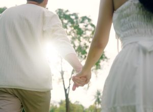 couple on a date holding hands