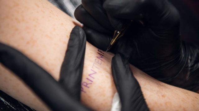 close-up of stick-and-poke tattoo on an arm