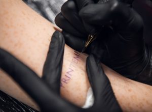close-up of stick-and-poke tattoo on an arm