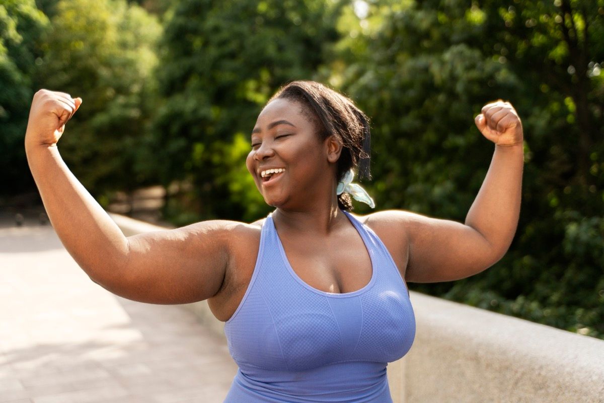 Portrait of beautiful smiling woman in sportswear 