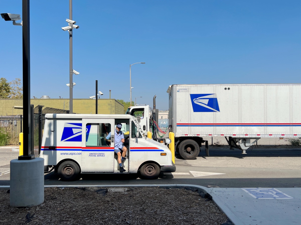 USPS delivery truck departure from USPS Annex at Los Angeles Downtown.