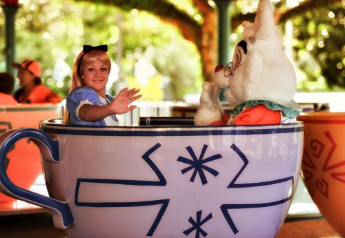 alice and the white rabbit on the teacups