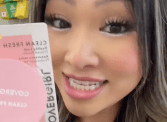 TikToker @beau.thi.ful holding up a Cover Girl makeup powder compact in a Dollar Tree store