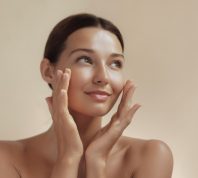 Skincare Beauty Photo of Woman with Clean Healthy Skin Touching Her Face