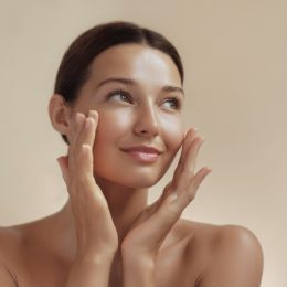 Skincare Beauty Photo of Woman with Clean Healthy Skin Touching Her Face