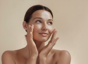 Skincare Beauty Photo of Woman with Clean Healthy Skin Touching Her Face