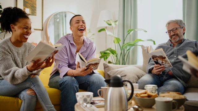 people laughing at a book club