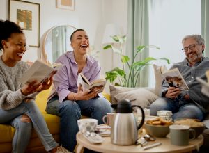 people laughing at a book club
