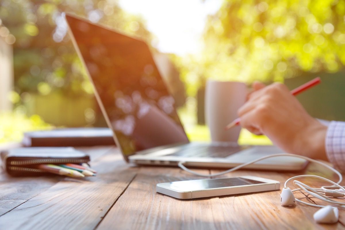 Freelance writer working outside closeup