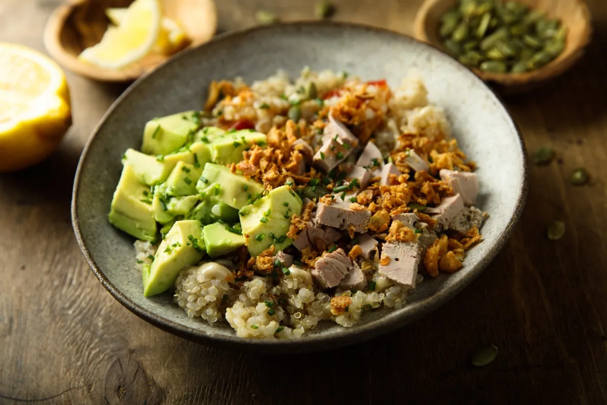 Healthy quinoa bowl with duck and avocado