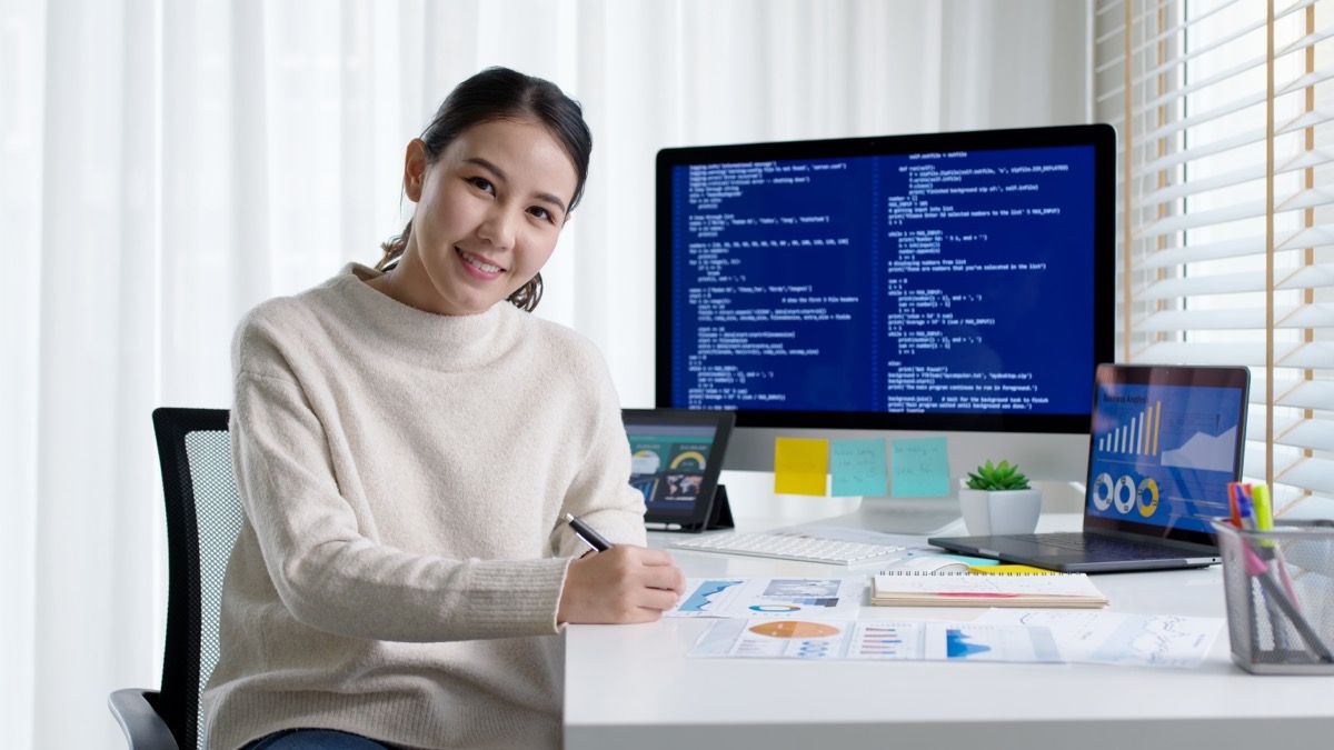 Young woman working as a remote data engineer