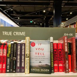 Books on true crime shelf at bookstore