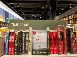 Books on true crime shelf at bookstore