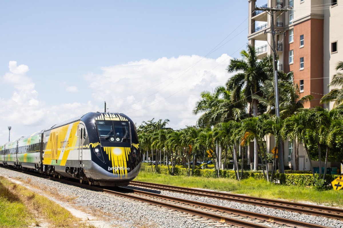 August 24, 2024: Brightline Train on railroad approaching station.