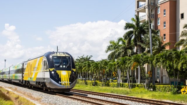 August 24, 2024: Brightline Train on railroad approaching station.