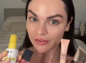 TikToker Kristyn Hoffman holding up makeup