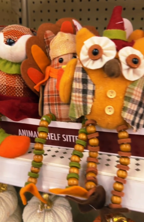 fall-themed animal shelf sitters at Dollar Tree