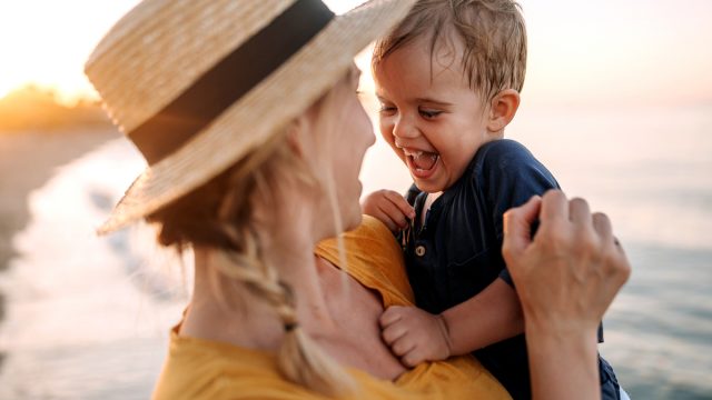 mom with son at beach